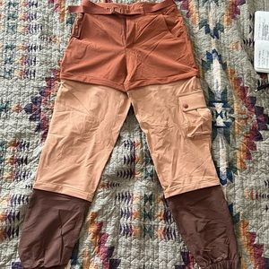 Outdoor Voices Rectrek Zipoff Pants in orange